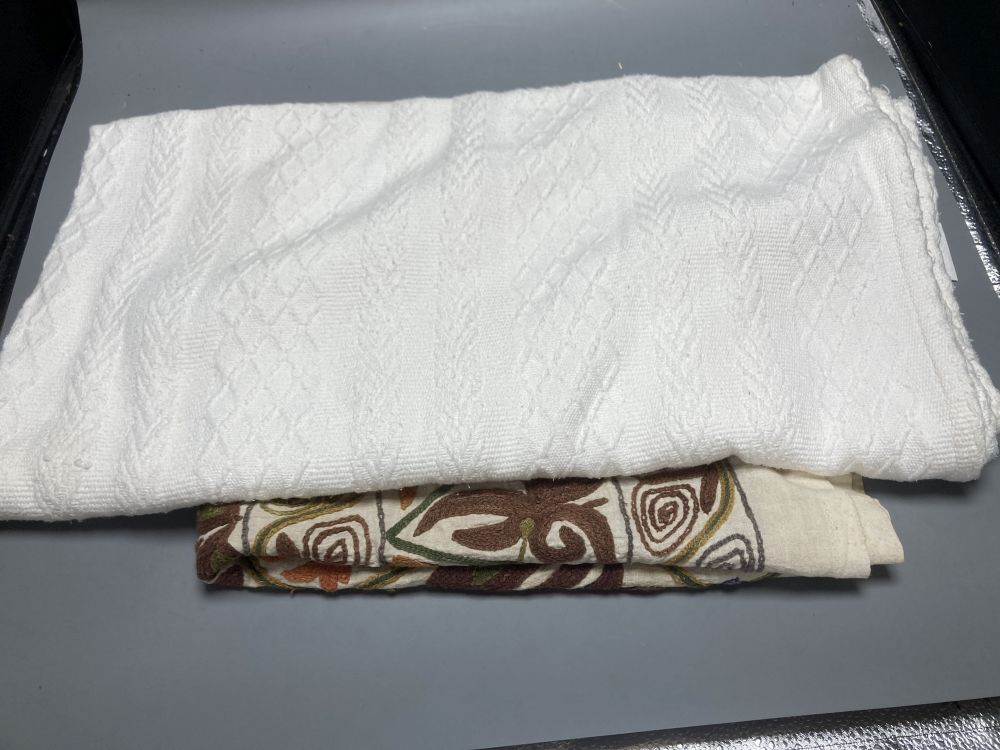 A kimono and assorted textiles